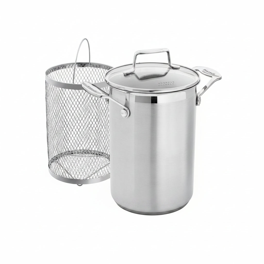 Stainless steel pot with lid and mesh basket on a white background